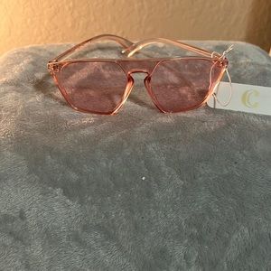 Light pink sun glasses